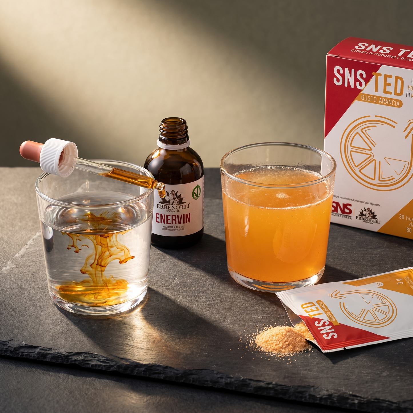 Modo d'uso Kit Energia & Vitalità: gocce di Enervin nell'acqua e bevanda all'arancia SNS TED già pronta